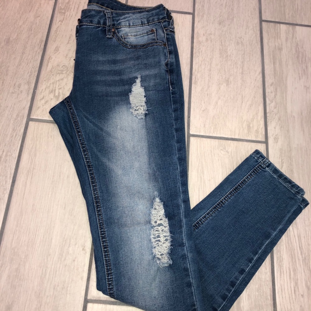 Distressed medium wash skinny jeans
